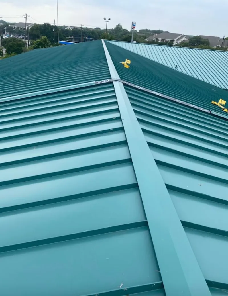 Green commercial metal roof ridge and valley for Metal Roof Repair in Jerseyville