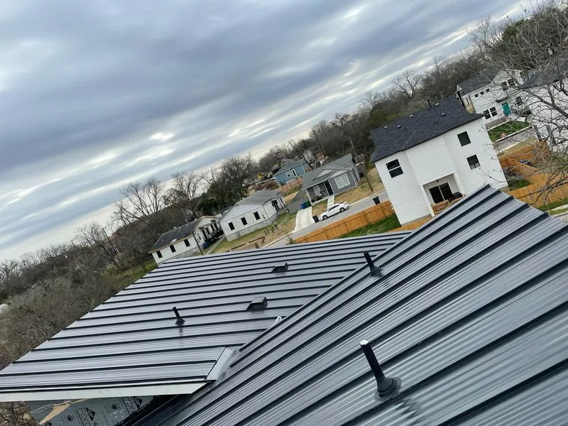 Standing seam metal roof panels with vents for Skylight Repair in Jerseyville